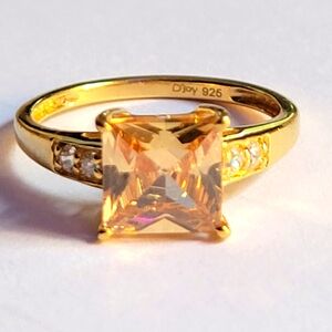 Champagne and white cz 14kt YG over sterling silver.